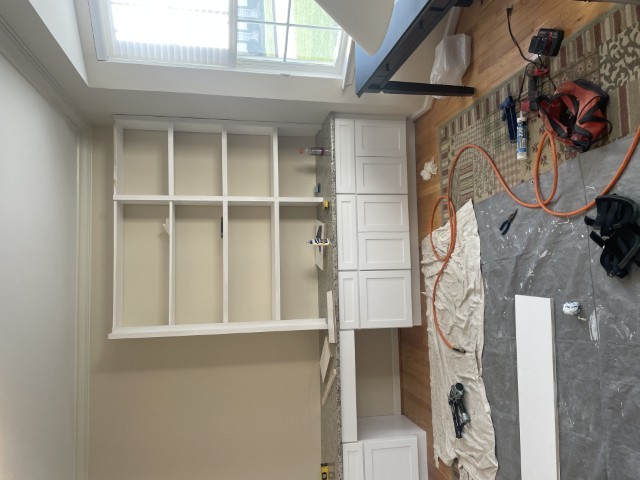 Thumbnail: cabinets being installed